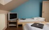 Pokoje jsou moderně zařízené a laděné do příjemných barev