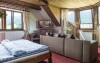 Pokoj Komfort: pokoje penzionu jsou zařízeny v duchu goralské architektury