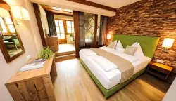 Szoba ággyal, Hotel Kolmhof ****, Bad Kleinkirchheim, Ausztria
