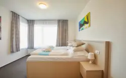 Interiéry pokojů, Hotel Rakovec *** u Brněnské přehrady