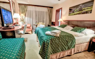 Třílůžkový pokoj v hlavní budově Hotelu Grand ****