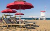 Umbrellas and sunbeds - Rimini Beach - Italy _