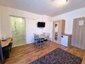 Földszinti négyágyas szoba terasszal, Duna Beach Apartman, Kimle, Magyarország